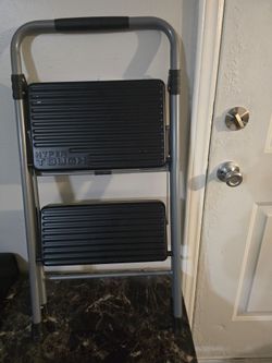 Two-step ladder with sturdy design.