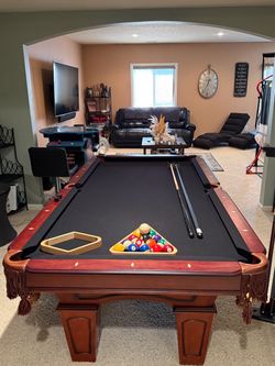 Pool Table with Balls and Cues