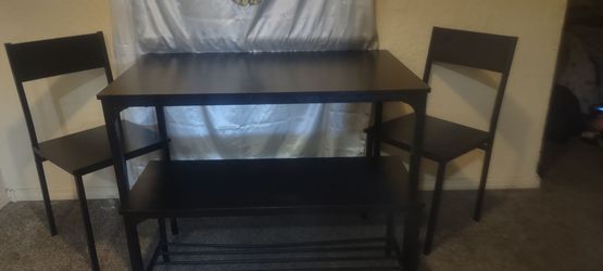 Table 2 chairs and bench good for an apartment , small dining area or porch like new $60