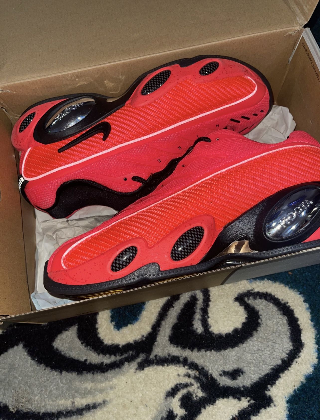 Red Nike Nocta sneakers