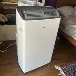Midea 12,000 BTU  Portable Air Conditioner dual hose