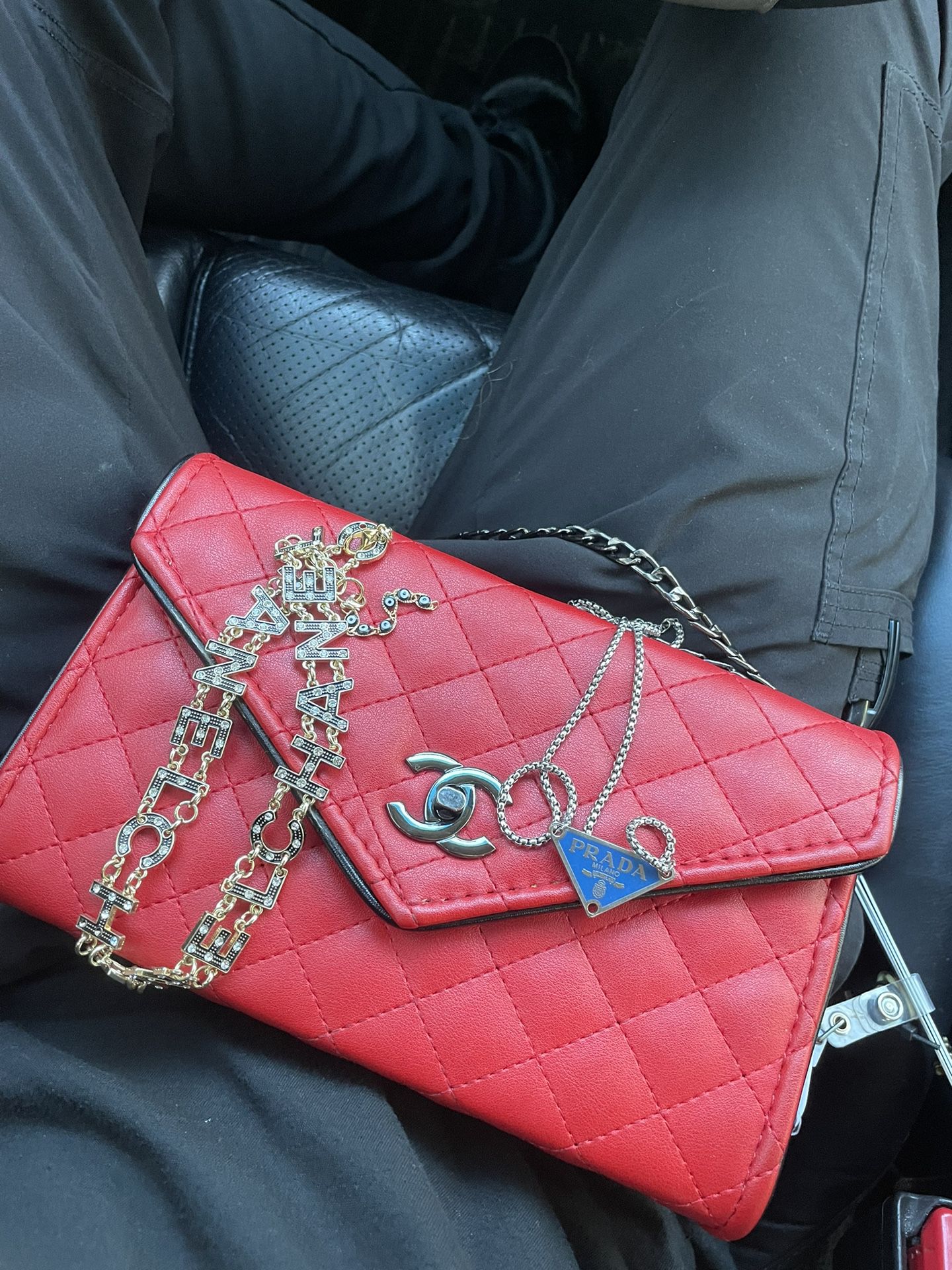 Chanel Bag, Chanel Necklace, and Prada Necklace