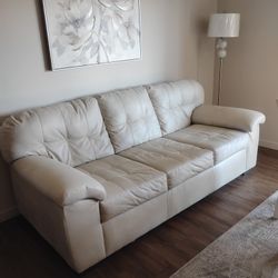 Two Leather Chairs And Dining Room Table
