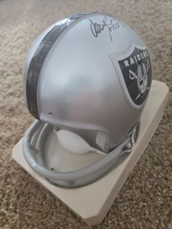 Raider mini helmet signed
