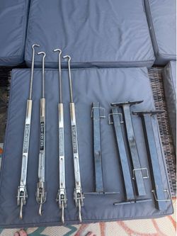 Fast gun spring loaded turnbuckle/Tru frame mounted camper tie downs