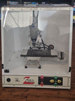 Dremel 3000 with Z Mill pitsco holder. Cords missing from z mill