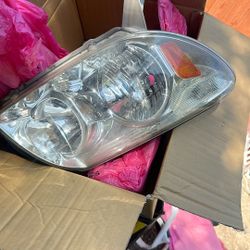 03-09 4 Runner OEM Headlights 