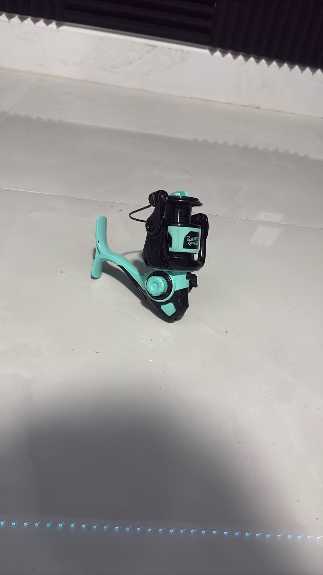 Teal ZEBCO Fishing Reel