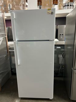 GE refrigerator, model GTS18HGNJRWW, white finish with top freezer.