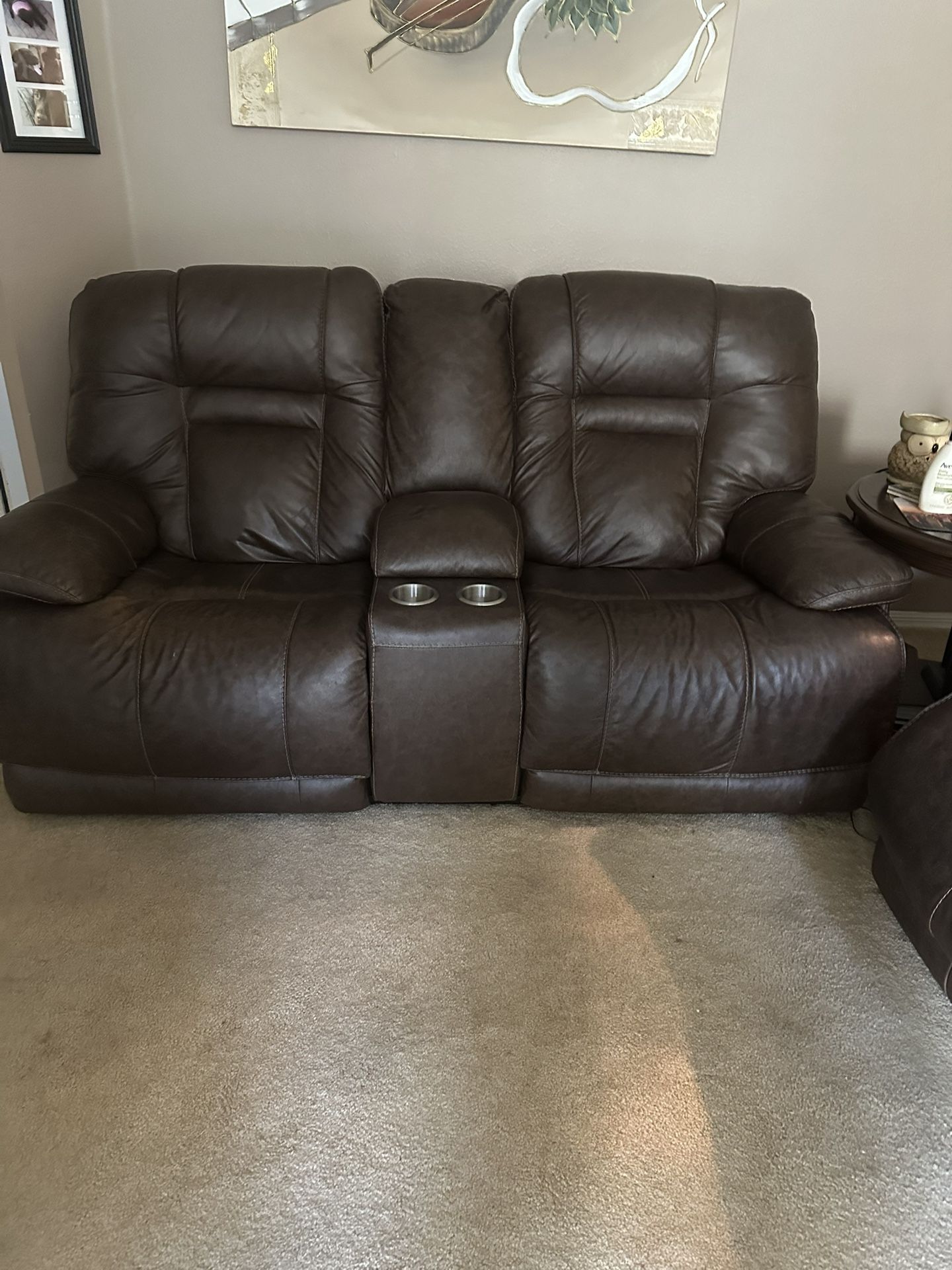 Duel leather power love seat