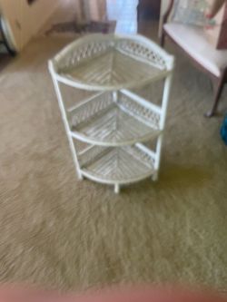 Vintage white wicker corner shelf