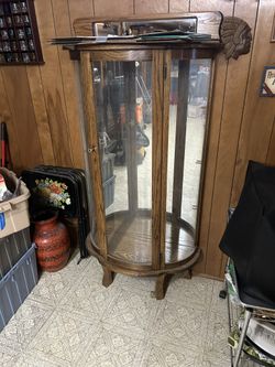 Half round oak display case with glass shelves