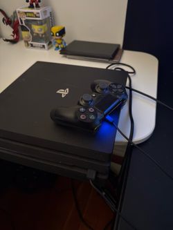 PlayStation 4 Pro with Controller + Marvel’s Spider Man