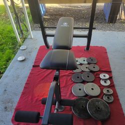 MARCY BENCH WITH INCLINE LEG EXTENSION  1" HOLE 6' BAR  TOTAL 110LBs 2-20s. 2-10s. 2-7.5s. 4-5s. 2-2.5s 
11525 S HALSTED DUNKIN/7111.S WESTERN WALGREE