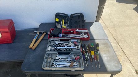 toolbox with all kinds of sockets from metric to standard hammers, screwdrivers assortment of tools