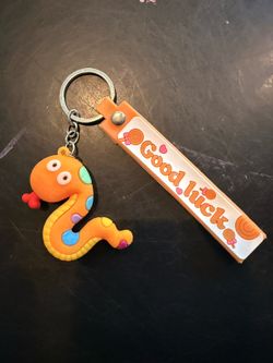Good Luck snake key chain with wrist strap.