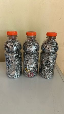 3 Gatoraid bottles of can tabs