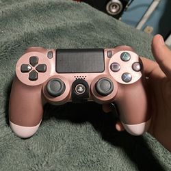 PS4 rose gold controller with STRIKEPACK