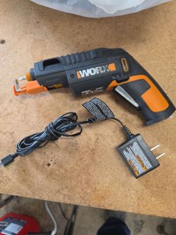 Power screwdriver with built in bits and screw holder