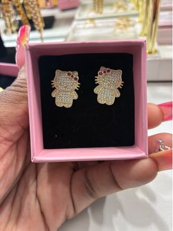 Hk earrings with red bow