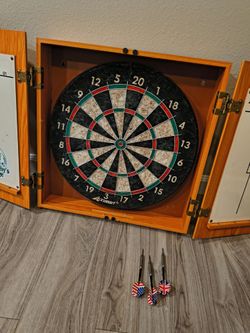 Used Dartboard $25 w/ 3 darts