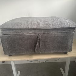 New, storage ottoman. Soft fabric, spacious inside