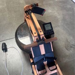 Row machine with cover and pump