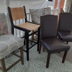 A Lot Of Different Chairs Some Tall Some Short