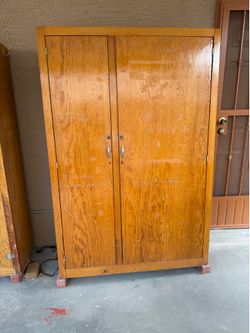 2 Large Storage Cabinets 72”x48”x16,5”, $ 85.00 each.