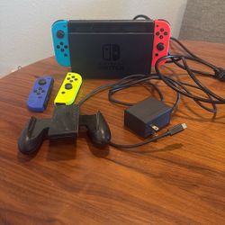 Original Nintendo Switch + Extra Controllers