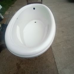 New Oval Tub - Used JACUZZI TUB