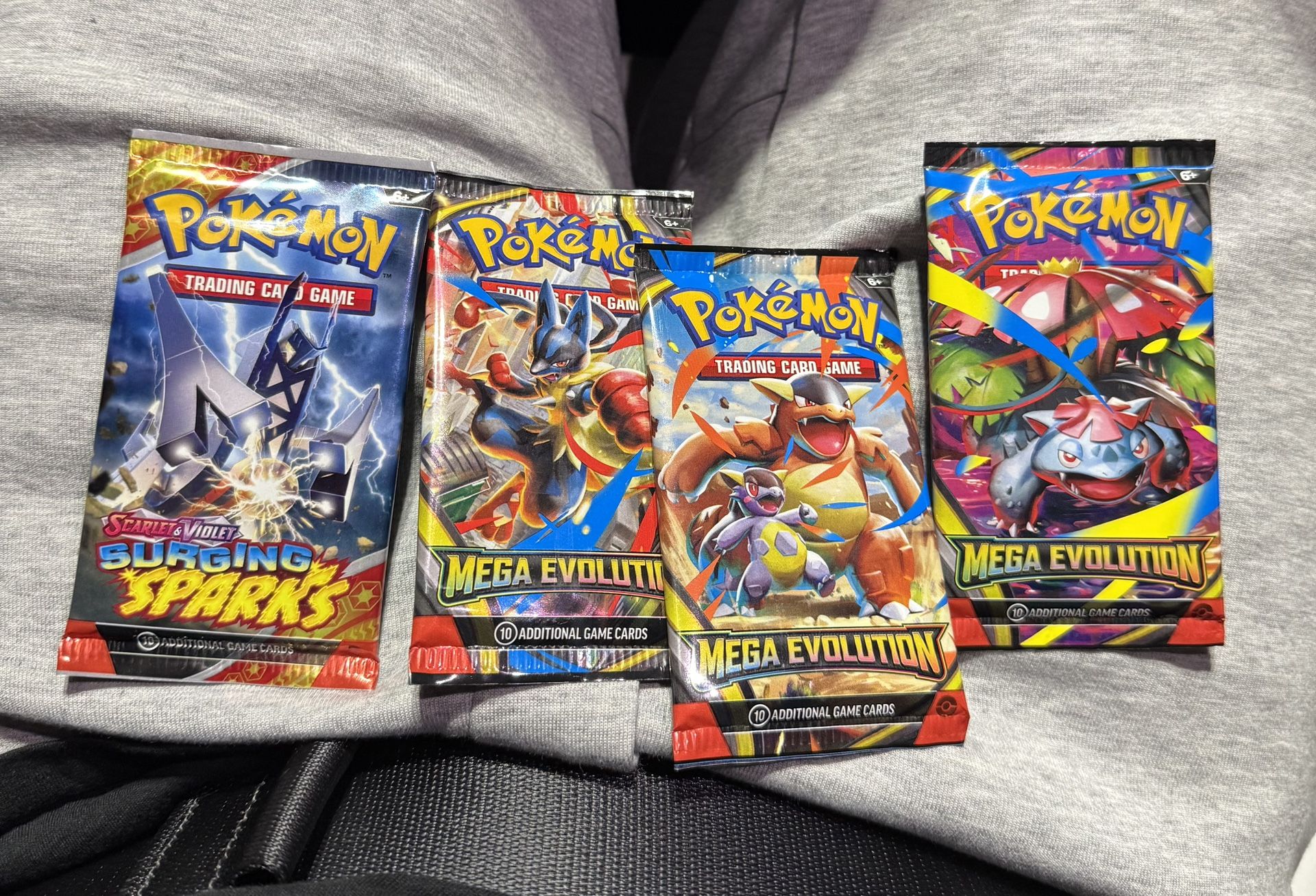 POKEMON Scarlet & Violet - Surging Sparks Booster Pack (10 Cards) & Mega Evolution Booster Pack(10 Cards)