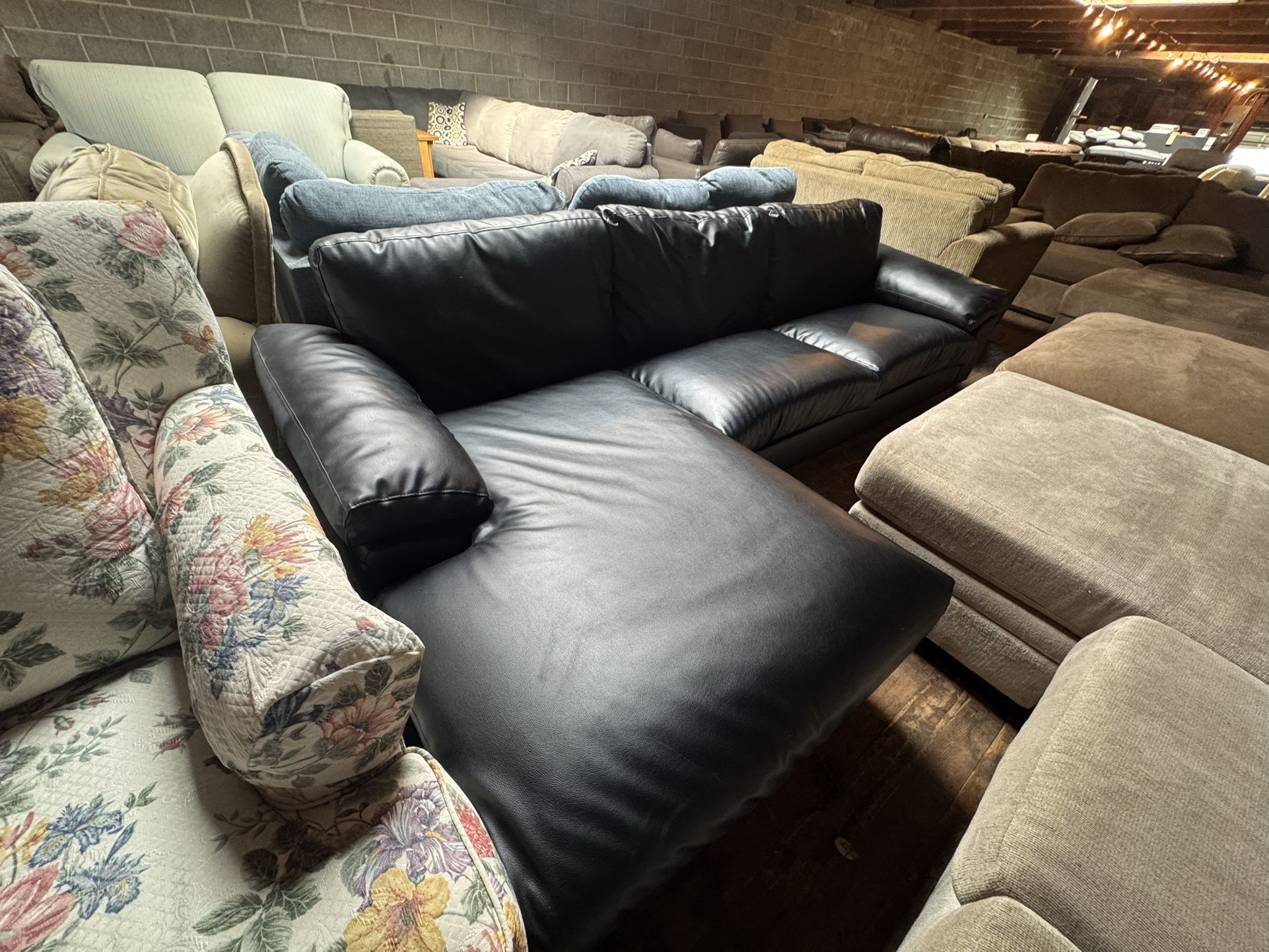 Black Pleather Sectional Couch “WE DELIVER”