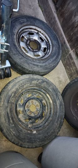 3 truck tires and rims