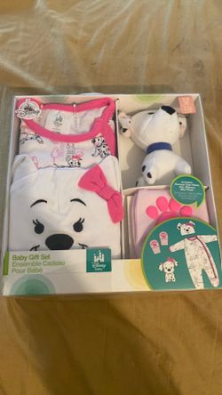 Disney Baby 101 Dalmatians 4-piece gift set that typically includes a romper, a character hat, mittens, and a mini plush toy