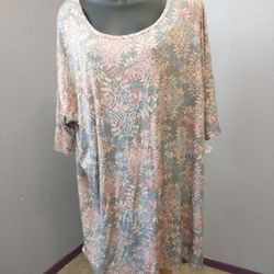 NWT lularoe xl irma multicolor floral patterned blouse 
48% polyester, 48% rayon & 4% spandex

