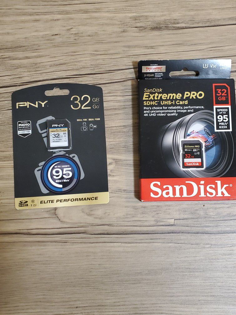 Three Memory Cards - One 256 Gb Micro SD, and Two 32 GB SD Cards
