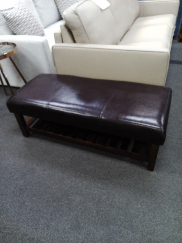 Brown Leatherette Bench W/Shelf.