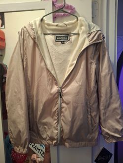 This Big Chill windbreaker in rose gold features a cozy white fleece