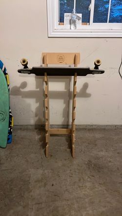 Longboard on Wooden Freestanding Rack