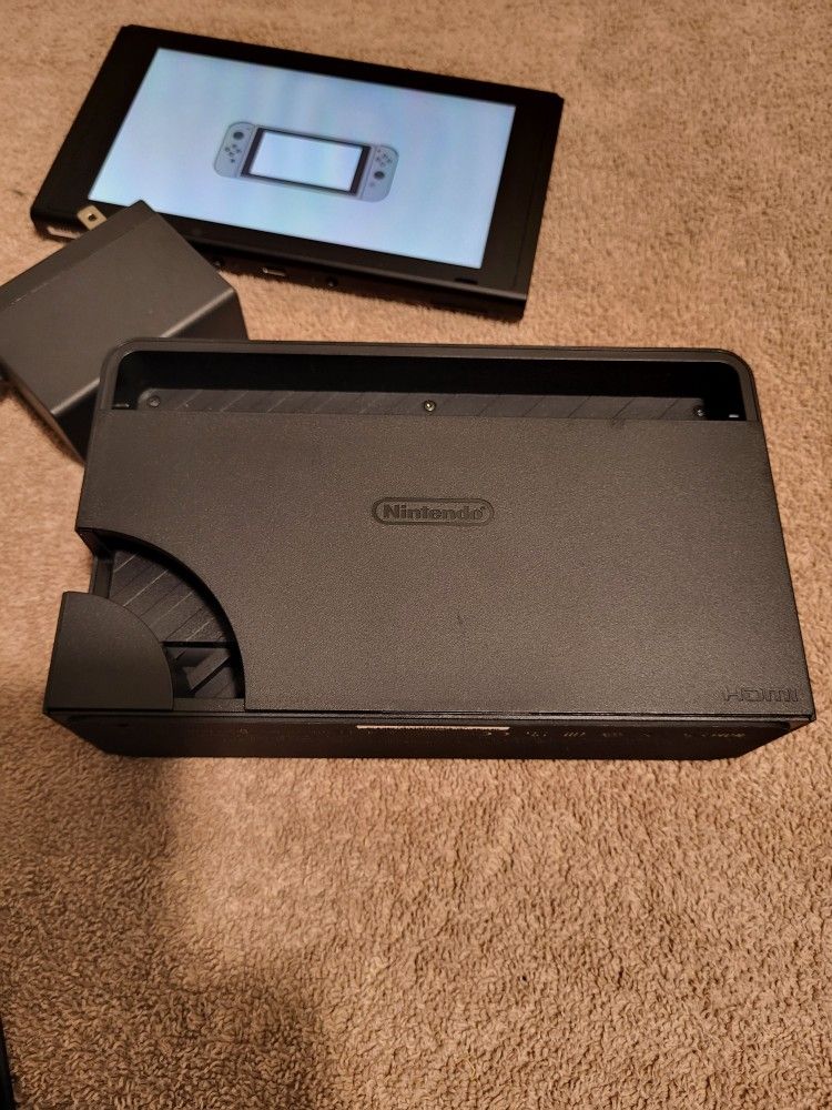 Nintendo Switch ( Barley Used)