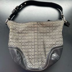 Authentic black m0782-f10923 handbag/purse with silver buckle