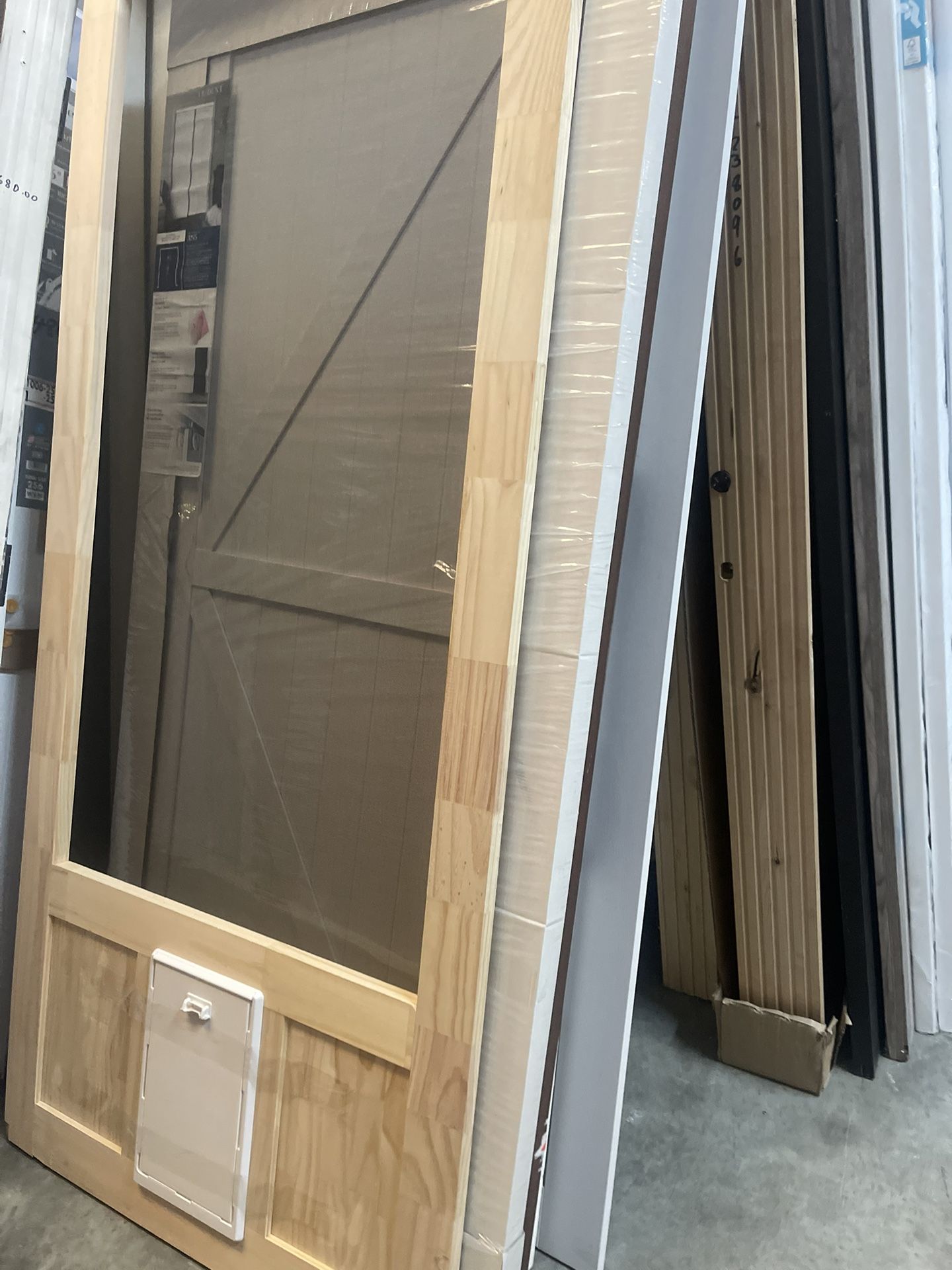 Screen Door With A Pet Guard