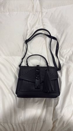 Aldo women’s black top handle and cross body strap with.