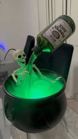 Halloween Skeleton Cauldron with Pouring Bottle Decoration