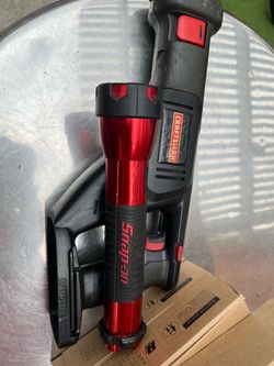 Reciprocating saw and flashlight