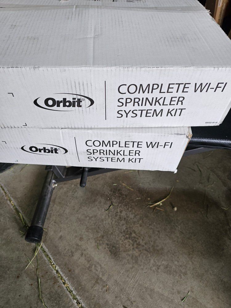 Two orbit wifi sprinkler systems with extra tubing.