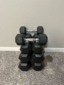 Rubber Hex Dumbbells: 10 lb pair, 15 lb pair, 20 lb single, 25 lb pair, and 30 lb pair.
