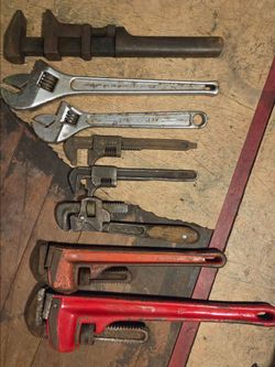 Plumbing pipe wrenches and Crescent wrenches ..