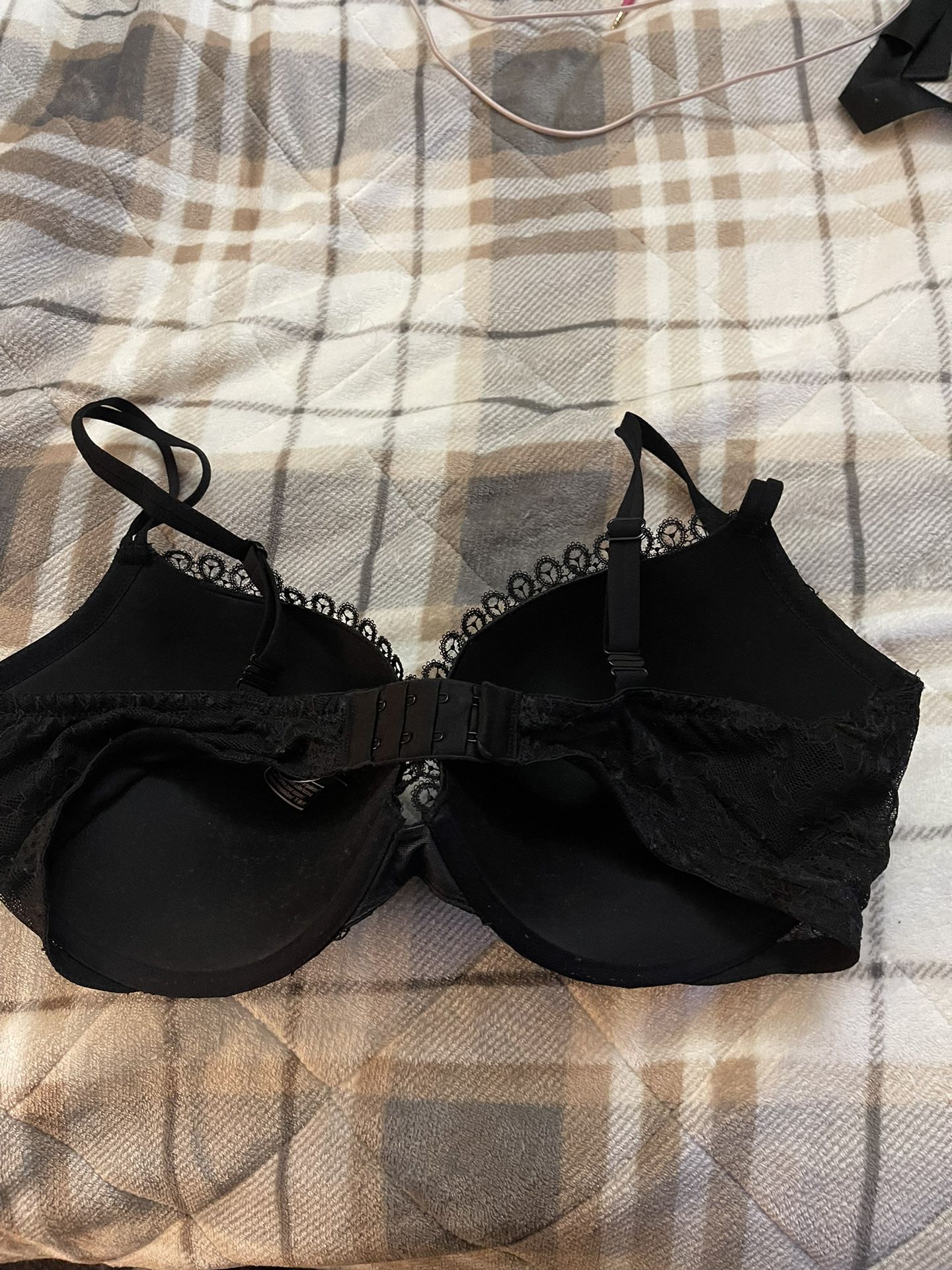 Victoria Secret very sexy push up bra in black lace with padding. Size is  38DD.